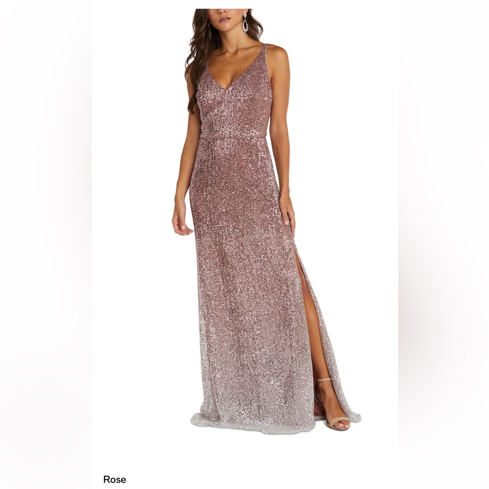 High-voltage sequins dim to a lighter shade of shimmer in this chic V-neck gow